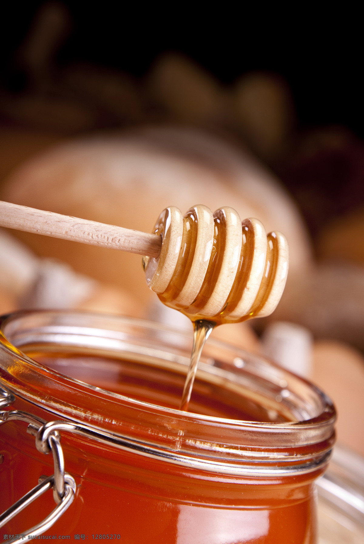 蜂蜜特写摄影 蜂蜜 蜜糖 蜜 健康食品 食品 传统美食 蜜罐 特写摄影 其他类别 餐饮美食 黑色